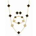 Ensemble de luxe en acier plaqué or 18 carats orné de trèfles noirs et de zirconiums cubiques