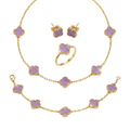 Ensemble complet en acier plaqué or 18 carats avec trèfles violets