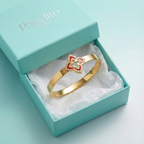 Bracelet rigide avec fleur à quatre pétales émaillée rouge et zircone - 100 % acier plaqué or 18 carats