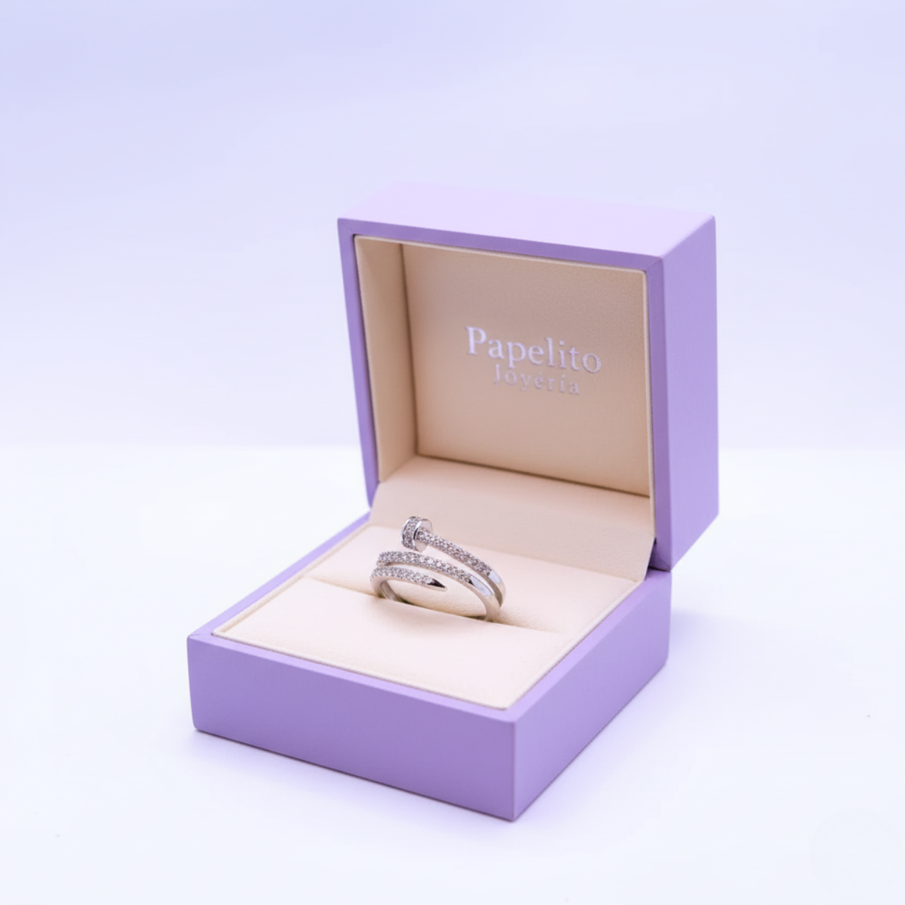 Anillo Ajustable "Clavo Rebeldía" Plateado con Circonitas – Acero Bañado en Oro Blanco 18K