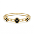 Bracelet rigide avec fleurs émaillées et détails ajourés - 100 % acier plaqué or 18 carats