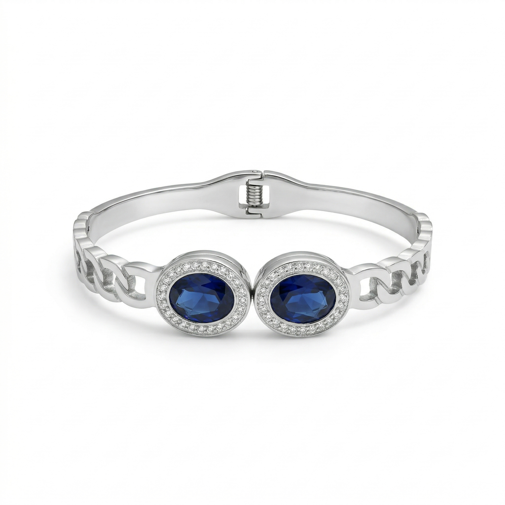 Bracelet rigide avec deux cristaux bleus ovales et zircones - 100 % acier rhodié
