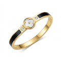 Bracelet rigide avec motif trèfle en nacre et zircone, détails émaillés noirs - 100 % acier plaqué or 18 carats