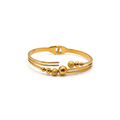 Bracelet rigide ouvert en acier plaqué or 18 carats avec perles lisses et texturées
