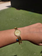 Pulsera Dorada con Moneda y Dije Ojo Turco – Acero Inoxidable 100% y Baño de Oro 18K