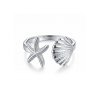 Anillo ajustable de acero con diseño abierto de estrella de mar y concha marina, acabado en plata, fabricado en España por Papelito.