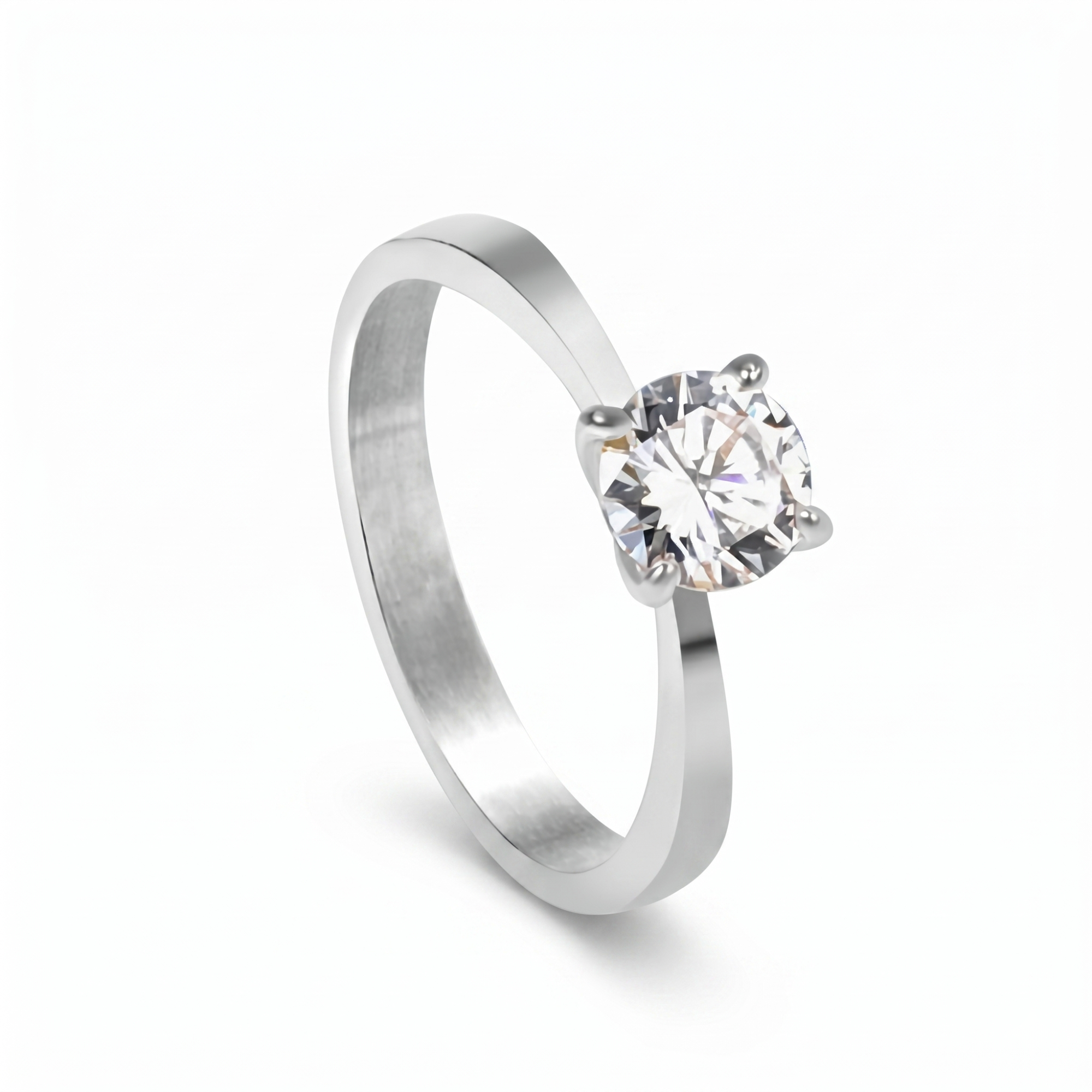 Anillo solitario de lujo para mujer con piedra brillante central en engaste de cuatro garras. Fabricado en 100% acero inoxidable con baño de oro blanco 18K. Joyería de alta gama hecha en Francia.