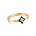 Brazalete rígido de acero bañado en oro de 18k con tecnología PVD y dije central de flor en esmalte negro con circonitas