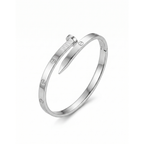 Brazalete rígido en forma de clavo de acero inoxidable 100% con baño de oro de 18k PVD, hecho en España.