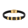 Brazalete de hombre en cuero negro trenzado con detalles de acero bañado en oro 18K. Joyería masculina de lujo fabricada en España con diseño elegante.