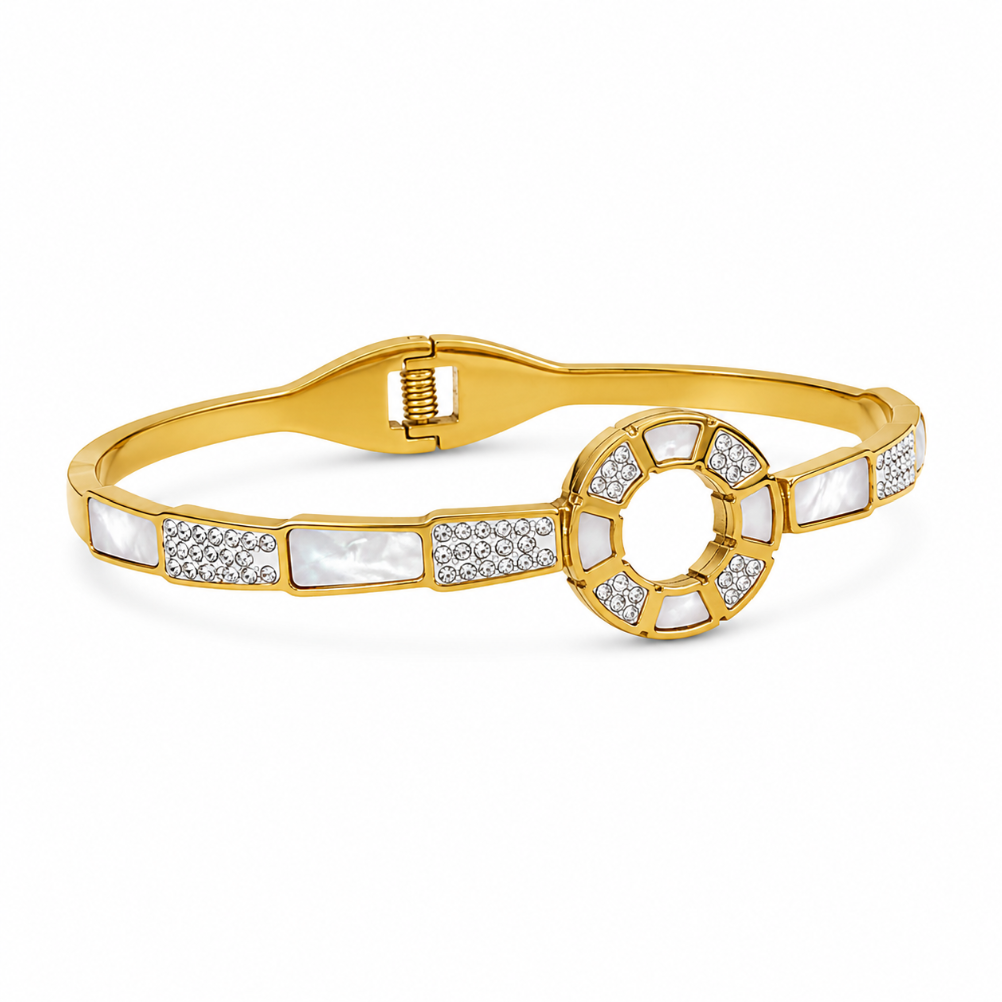 Brazalete rígido de acero en color oro de 18K con elemento central circular e incrustaciones alternadas de nácar blanco y circonitas brillantes.
