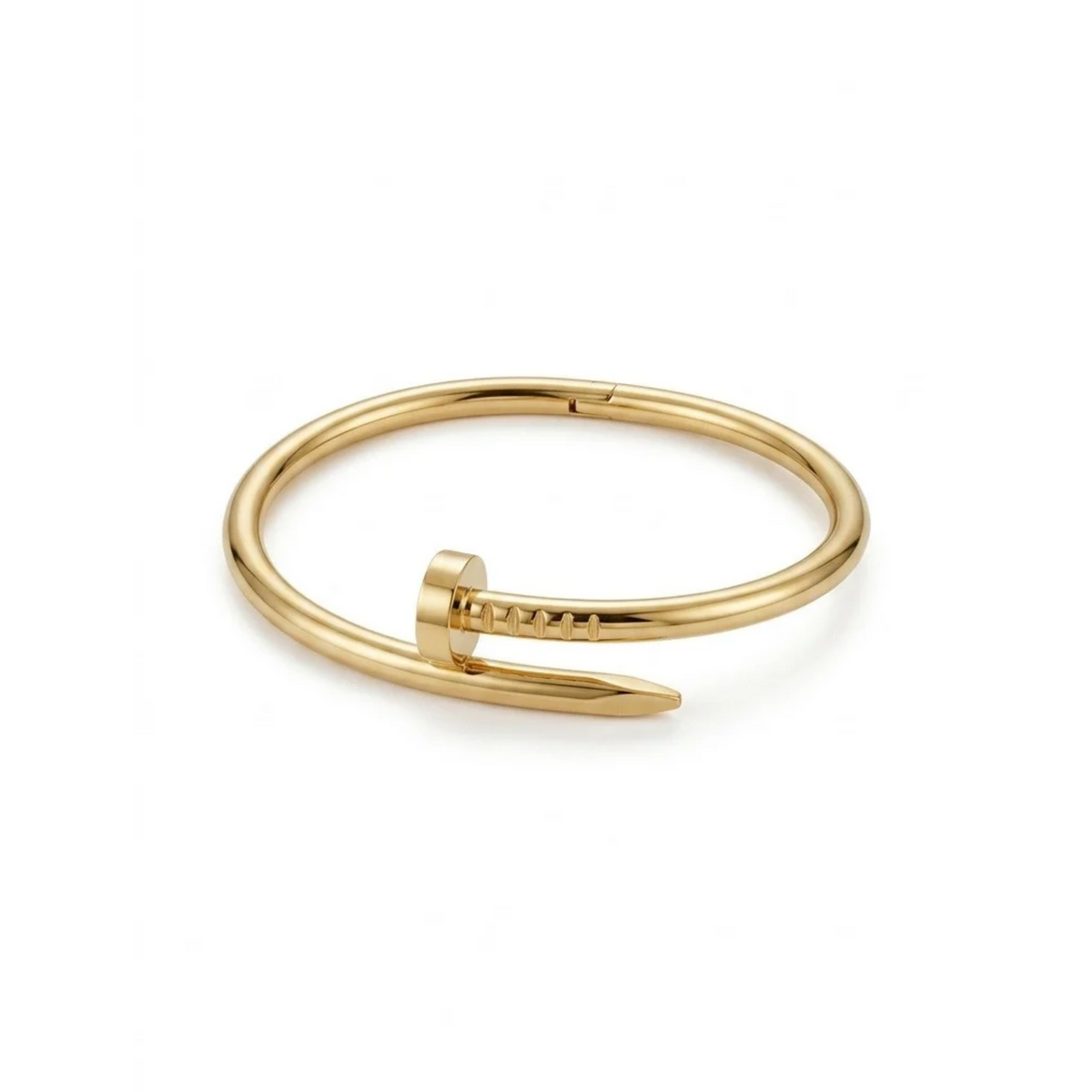 Brazalete rígido dorado con diseño minimalista en forma de clavo envolvente[cite: 22], con laminado en oro premium 18K PVD hecho en España.