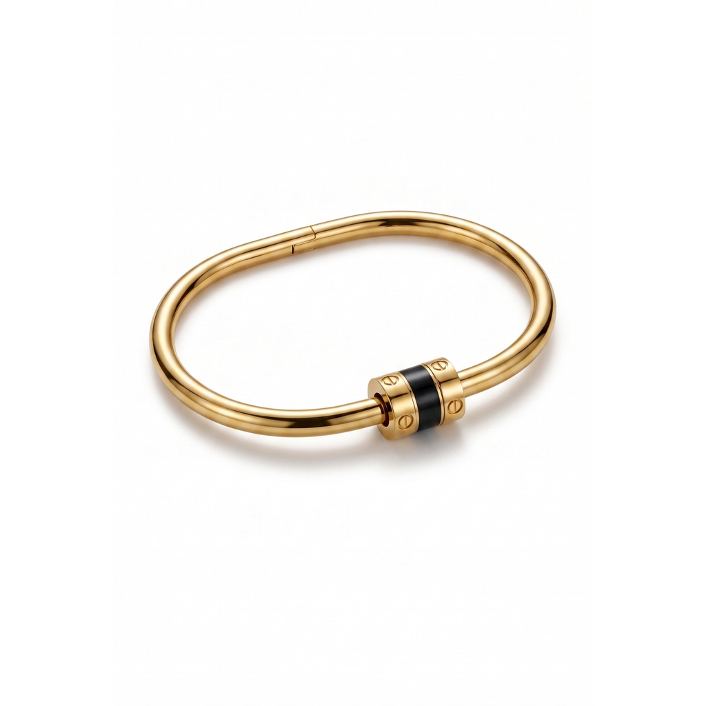 Brazalete rígido ovalado de acero inoxidable 100% bañado en oro de 18k PVD con detalle central negro, hecho en Francia.