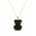 Collar de cadena con colgante en forma de oso con incrustaciones de cristales negros y borde circundado de circonitas doradas bañadas en oro de 18K.