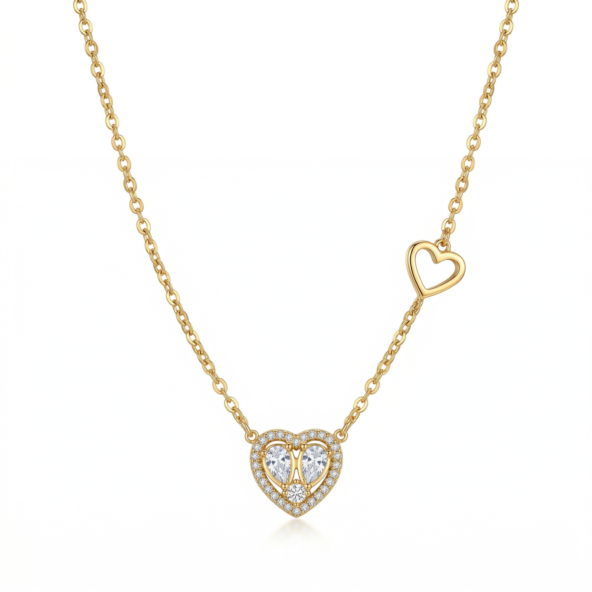 Collar de acero inoxidable bañado en oro de 18k con colgante de corazón brillante y un pequeño corazón calado lateral en la cadena, de la marca Papelito Málaga.