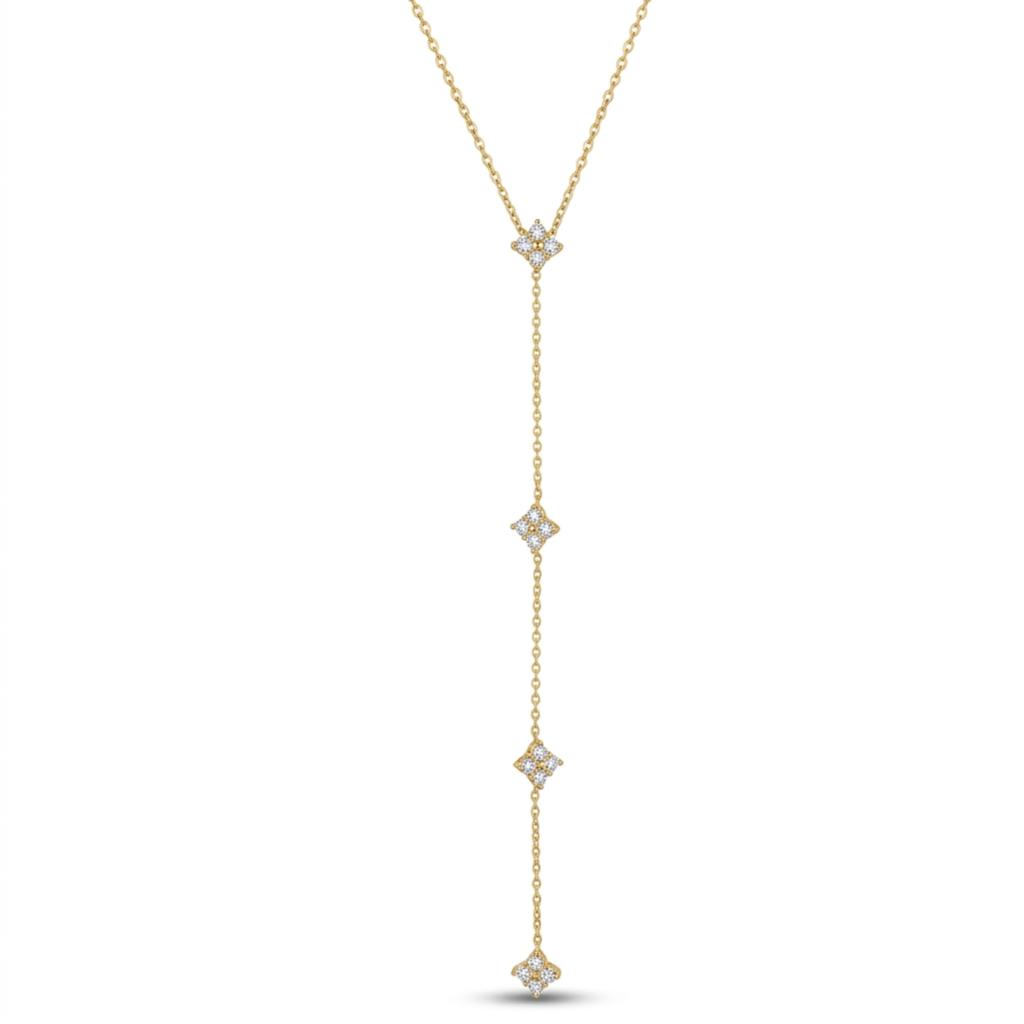 Collar de acero estilo corbata lariat chapado en oro de 18k con fina cadena colgante decorada con cuatro motivos de trébol brillantes en pavé de circonitas, hecho en España.