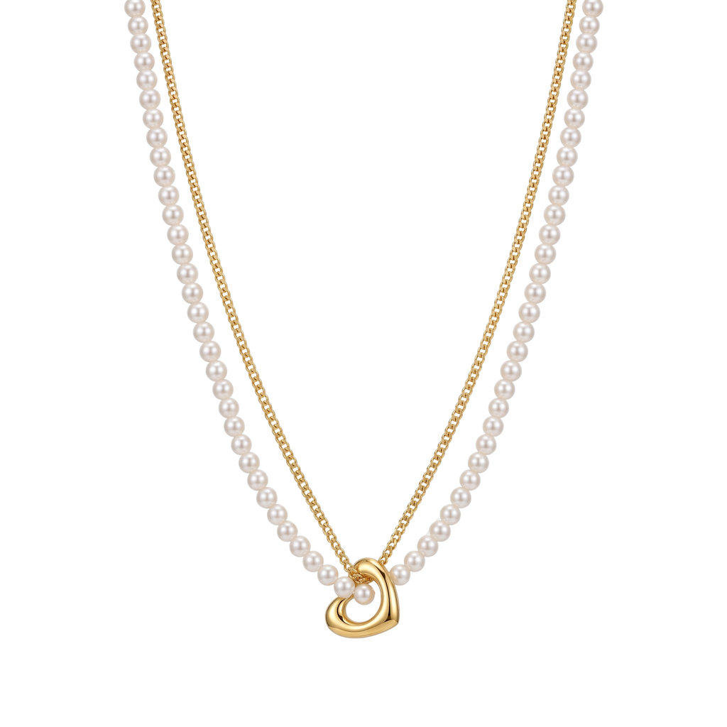 Collar doble con hilera de perlas y cadena de acero bañada en oro de 18k PVD con dije de corazón hecho en Portugal.