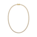 Collar de estilo tennis dorado engastado con hilera continua de circonitas brillantes[cite: 29], con laminado en oro premium 18K PVD hecho en España.