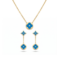 Conjunto de collar y pendientes colgantes en acero inoxidable con baño de oro 18k y esmalte azul turquesa hecho en España.