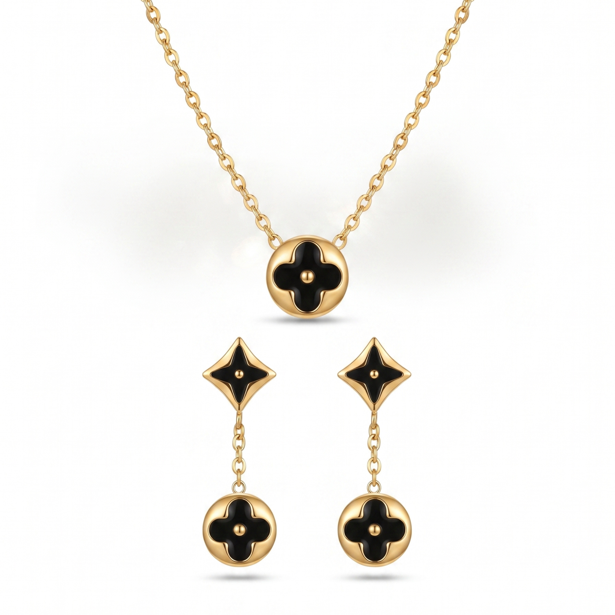 Conjunto de collar y pendientes colgantes con motivo floral de esmalte negro en acero bañado en oro 18K PVD hecho en España