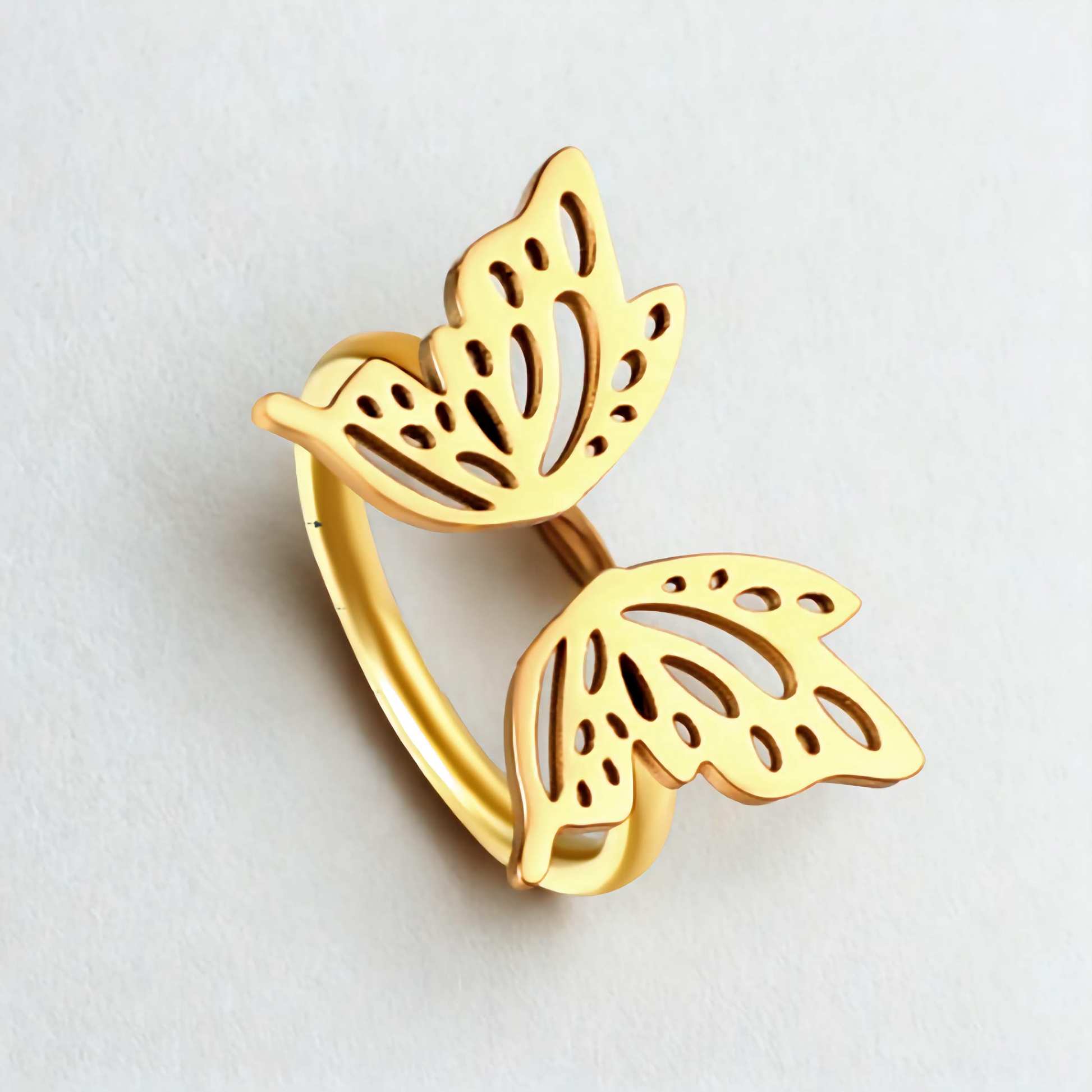 Bague papillon ajourée en acier inoxydable plaqué or