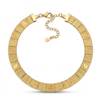 Gargantilla rígida articulada de acero con placas doradas chapada en oro de 18k, alternando texturas estriadas y motivos circulares con línea central grabada, hecha en Francia.