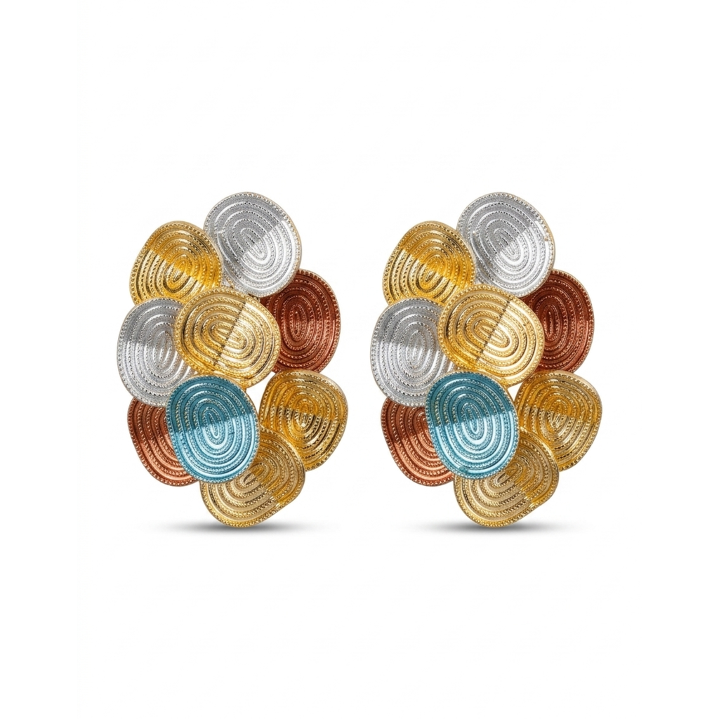 Pendientes maximalistas de diseño tridimensional con espirales concéntricas en baño de oro de 18K y acrílico texturizado de tonos oro, plata, cobre y azul turquesa, fabricados en España.