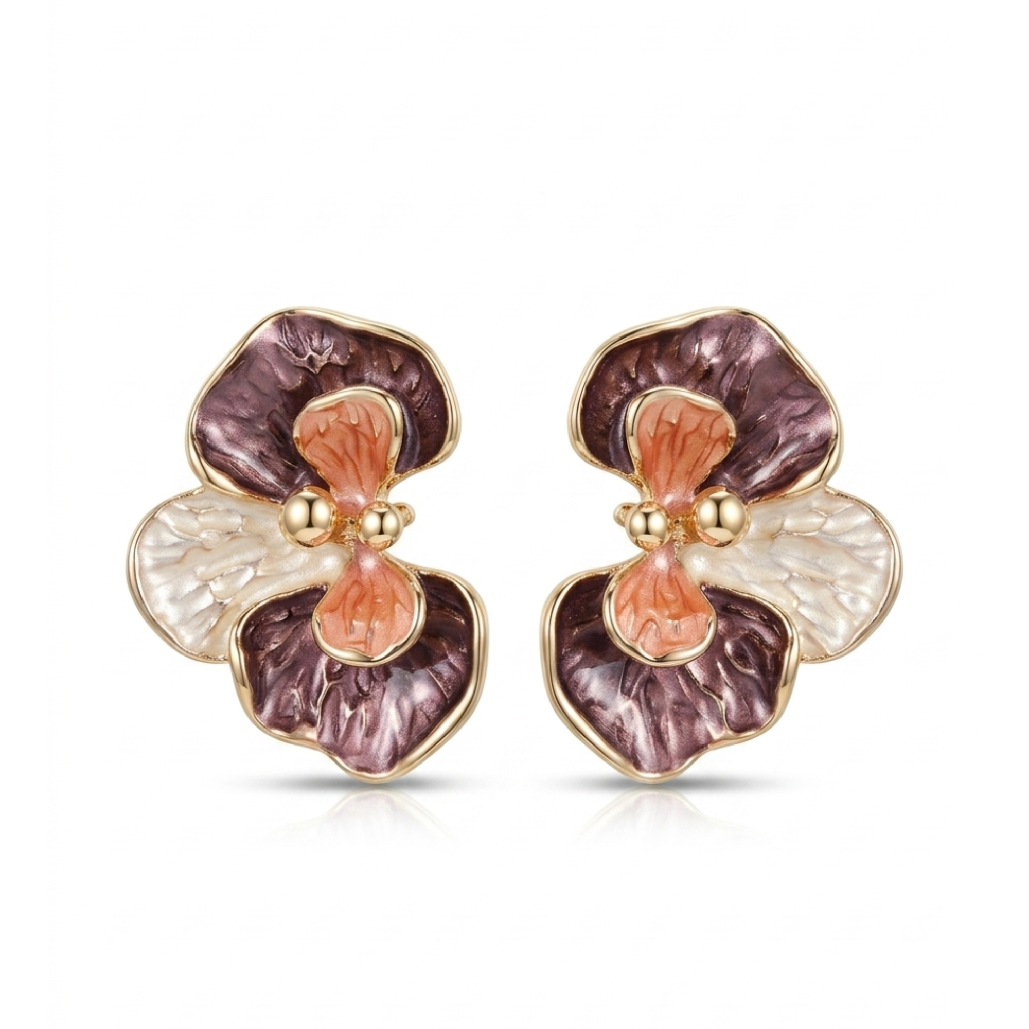 Pendientes de diseño botánico en forma de flor de orquídea con baño de oro de 18K y pétalos acrílicos texturizados en tonos borgoña, rosa y nácar, hechos en España.