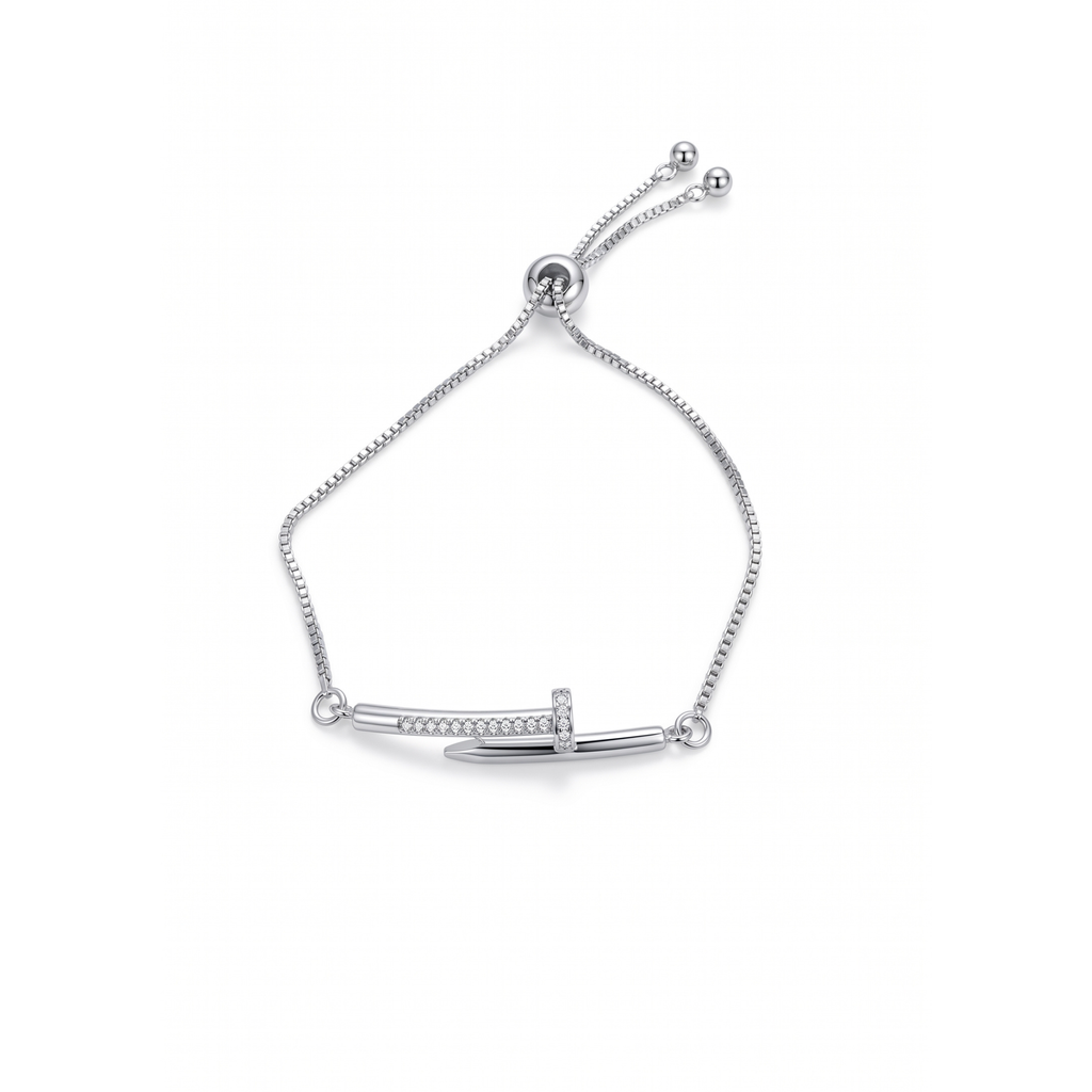 Pulsera ajustable de acero bañada en oro 18k PVD con motivo de clavo y circonitas brillantes hecha en España.