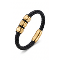 Pulsera de cuero trenzado negro con tres abalorios hexagonales y cierre magnético bañados en oro de 18K, hecha en España.