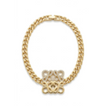 Pulsera de eslabones bañada en oro de 18k PVD con motivo central entrelazado y circones brillante, hecha en España.