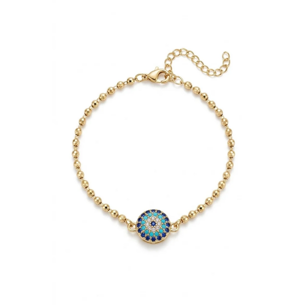 Pulsera de esferas doradas bañada en oro de 18k PVD con medallón de ojo turco en circones azules y turquesas, hecha en España.