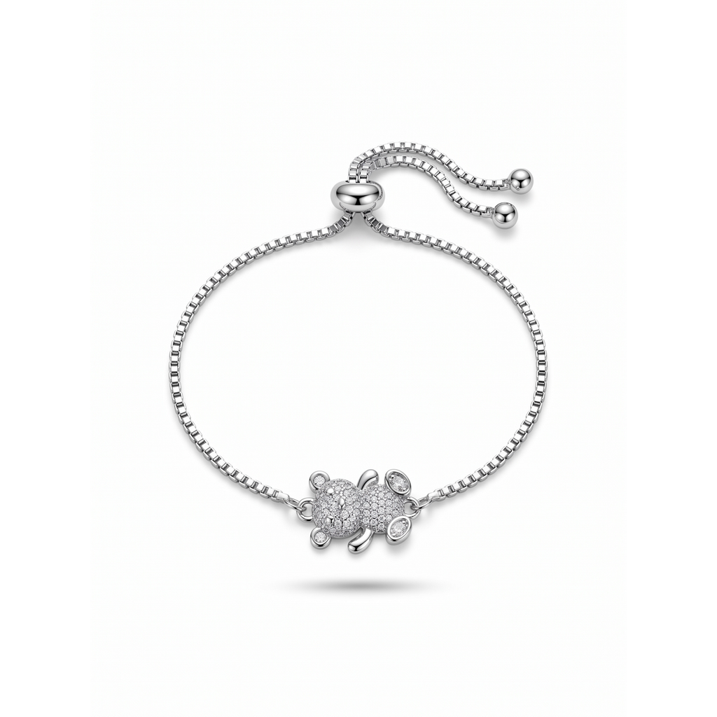 Pulsera ajustable de acero con baño en plata 925 PVD y charm de oso en pavé de circonitas fabricada en España