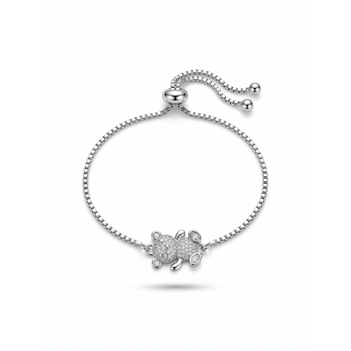 Pulsera ajustable de acero con baño en plata 925 PVD y charm de oso en pavé de circonitas fabricada en España