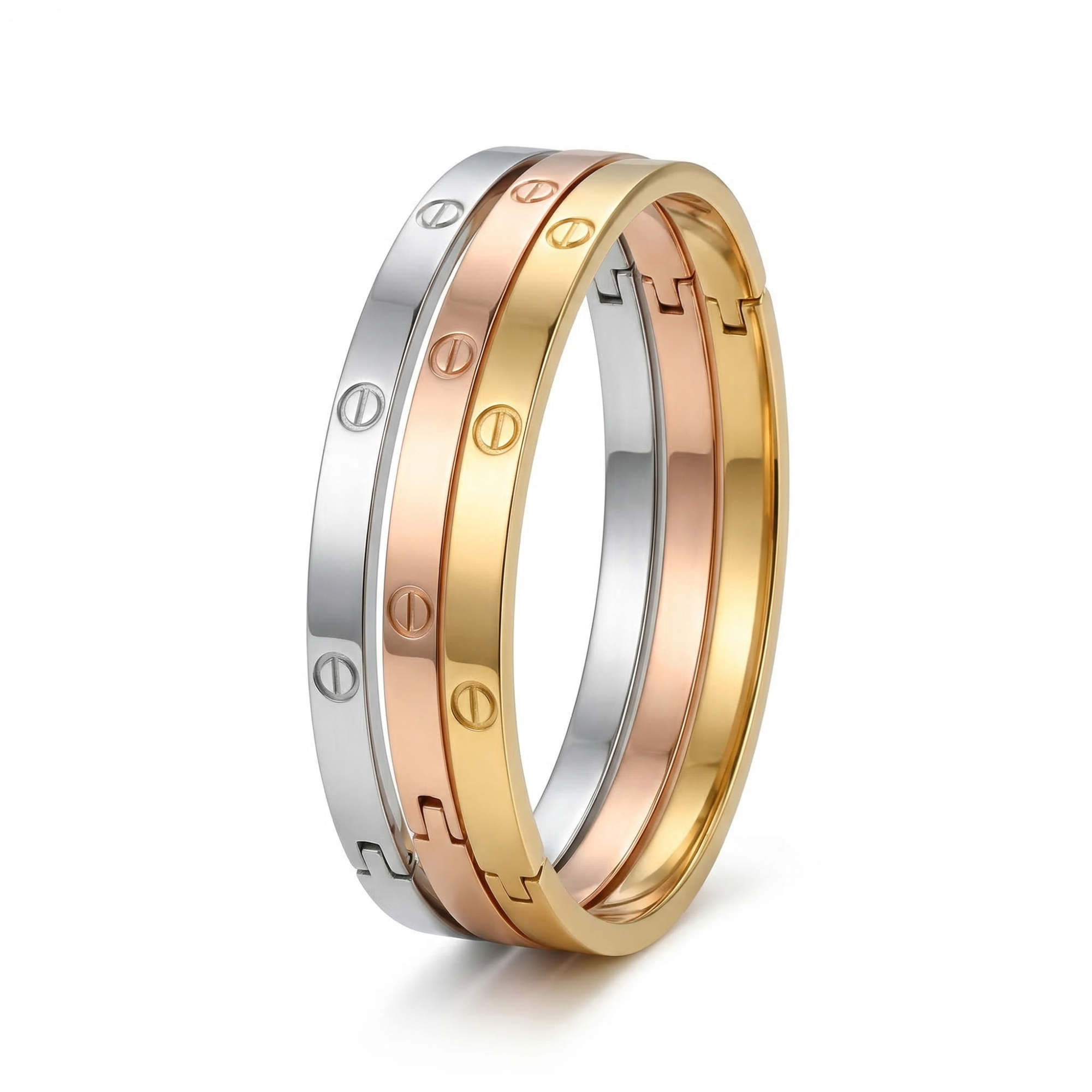 Trío de pulseras rígidas de acero inoxidable con baño de oro 18K PVD hechas en España
