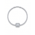 Pulsera estilo tenis en acero con baño de oro 18k PVD y piedra central corte esmeralda con halo de circonitas brillantes.