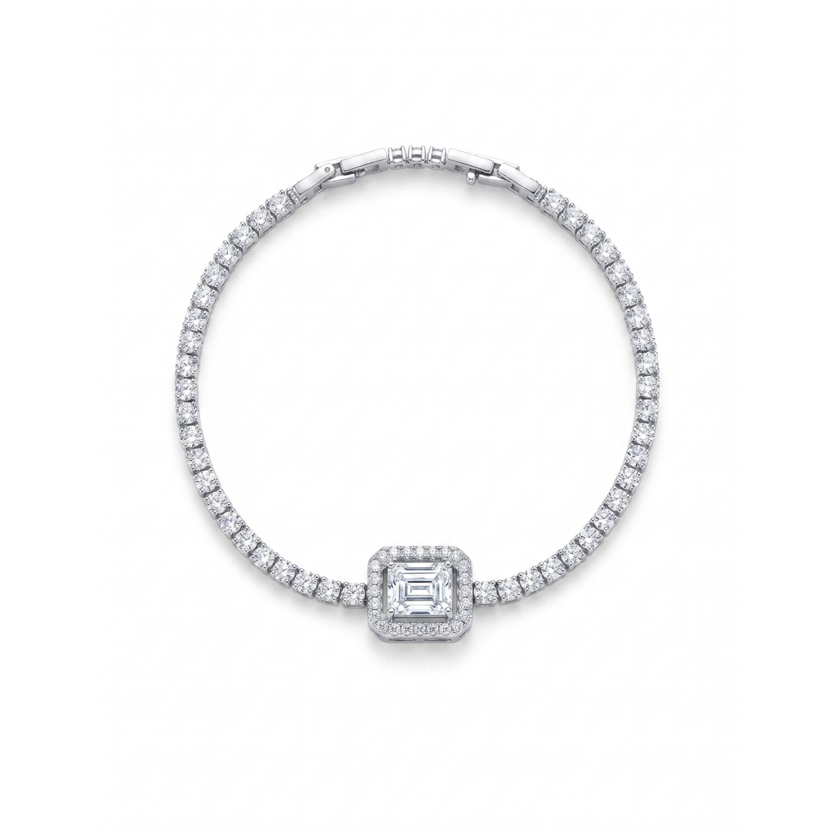 Pulsera estilo tenis en acero con baño de oro 18k PVD y piedra central corte esmeralda con halo de circonitas brillantes.