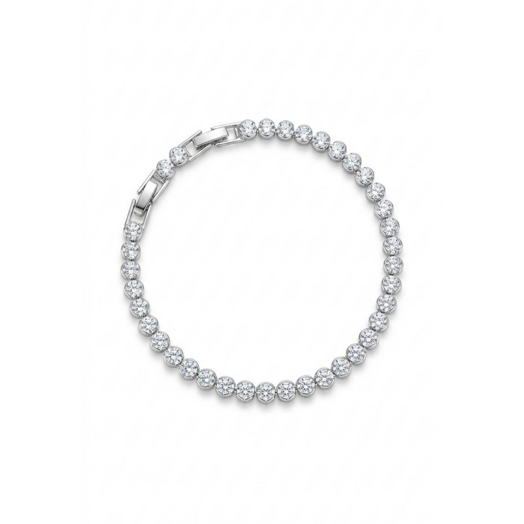 Pulsera tennis de circonitas redondas engastadas en chatón en acabado plata brillante[cite: 13], con laminado en oro premium 18K PVD hecho en España.