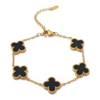 Pulsera Trèfle Signature negra con cadena dorada