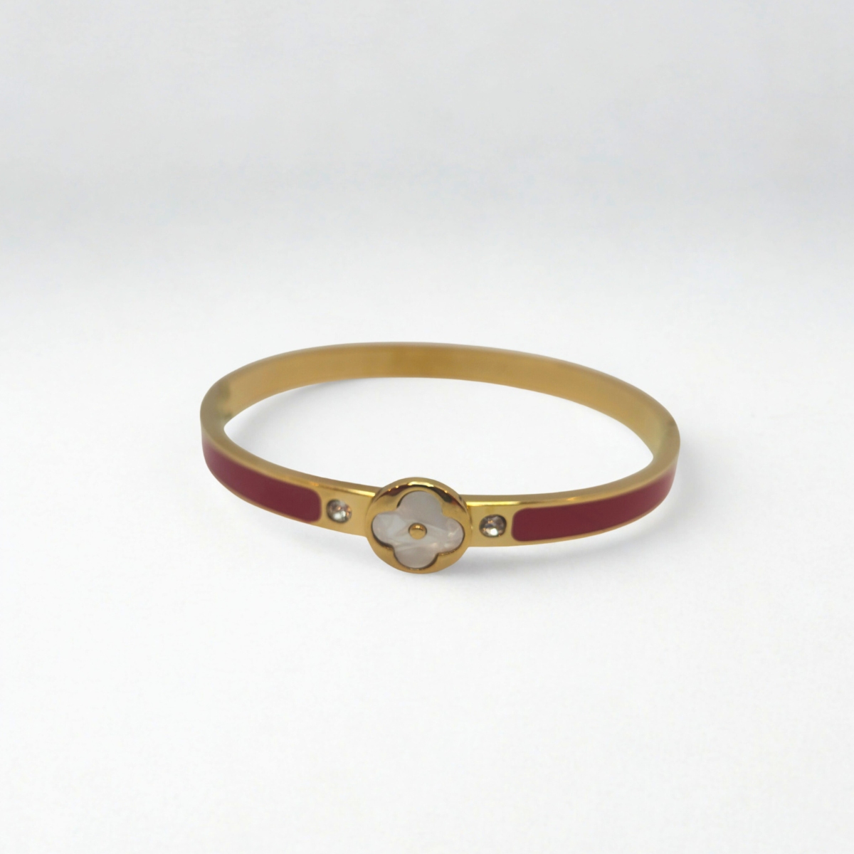 Bracelet rigide avec trèfle en nacre et zircone, détails émaillés rouges - 100 % acier plaqué or 18 carats