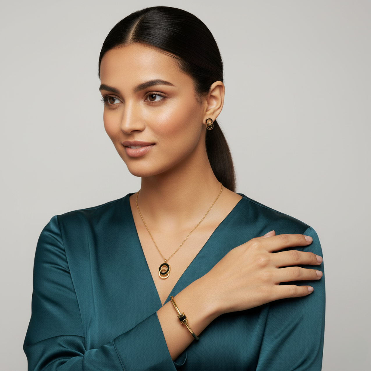 Conjunto de Aros Entrelazados y Brazalete con Detalle Negro (Collar, Pendientes y Pulsera) - 100% Acero Bañado en Oro 18K