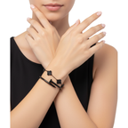 Dúo de Pulseras Negras de Acero: Brazalete Clavo y Cadena Trébol