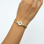 Pulsera Rígida con Ojo Turco y Nácar - 100% Acero Bañado en Oro 18K