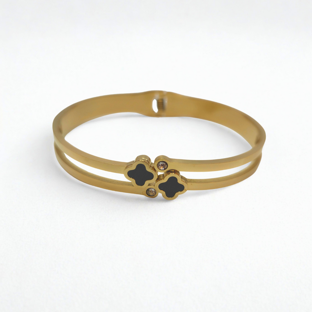 Bracelet rigide double bande avec trèfles émaillés noirs et zircones - 100 % acier plaqué or 18 carats