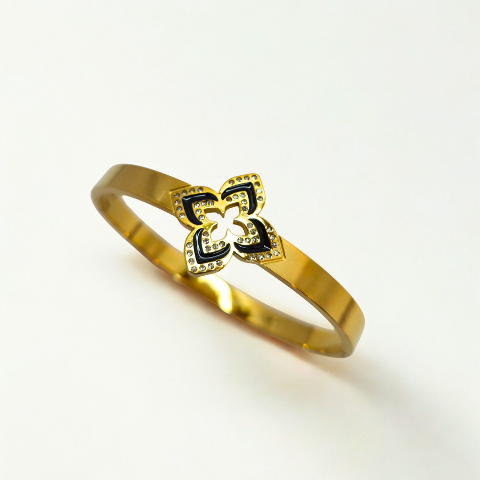 Bracelet rigide avec fleur émaillée à quatre pétales et zircone - 100 % acier plaqué or 18 carats