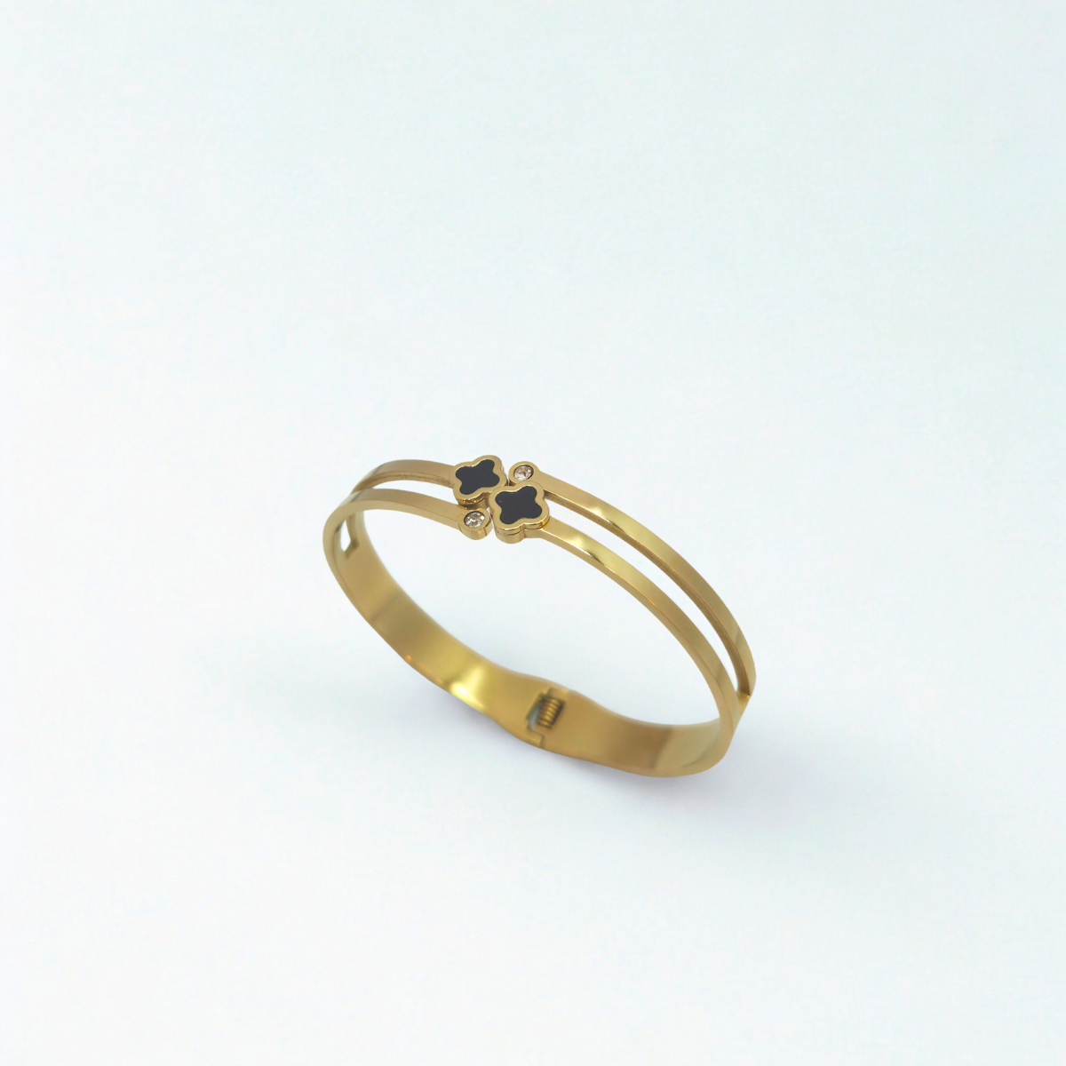 Bracelet rigide double bande avec trèfles émaillés noirs et zircones - 100 % acier plaqué or 18 carats