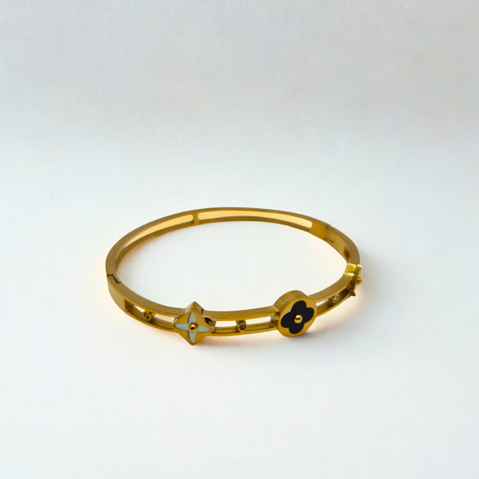 Bracelet rigide avec fleurs émaillées et détails ajourés - 100 % acier plaqué or 18 carats