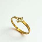 Pulsera Rígida con Flor de Cuatro Pétalos Esmaltada y Circonitas - 100% Acero Bañado en Oro 18K