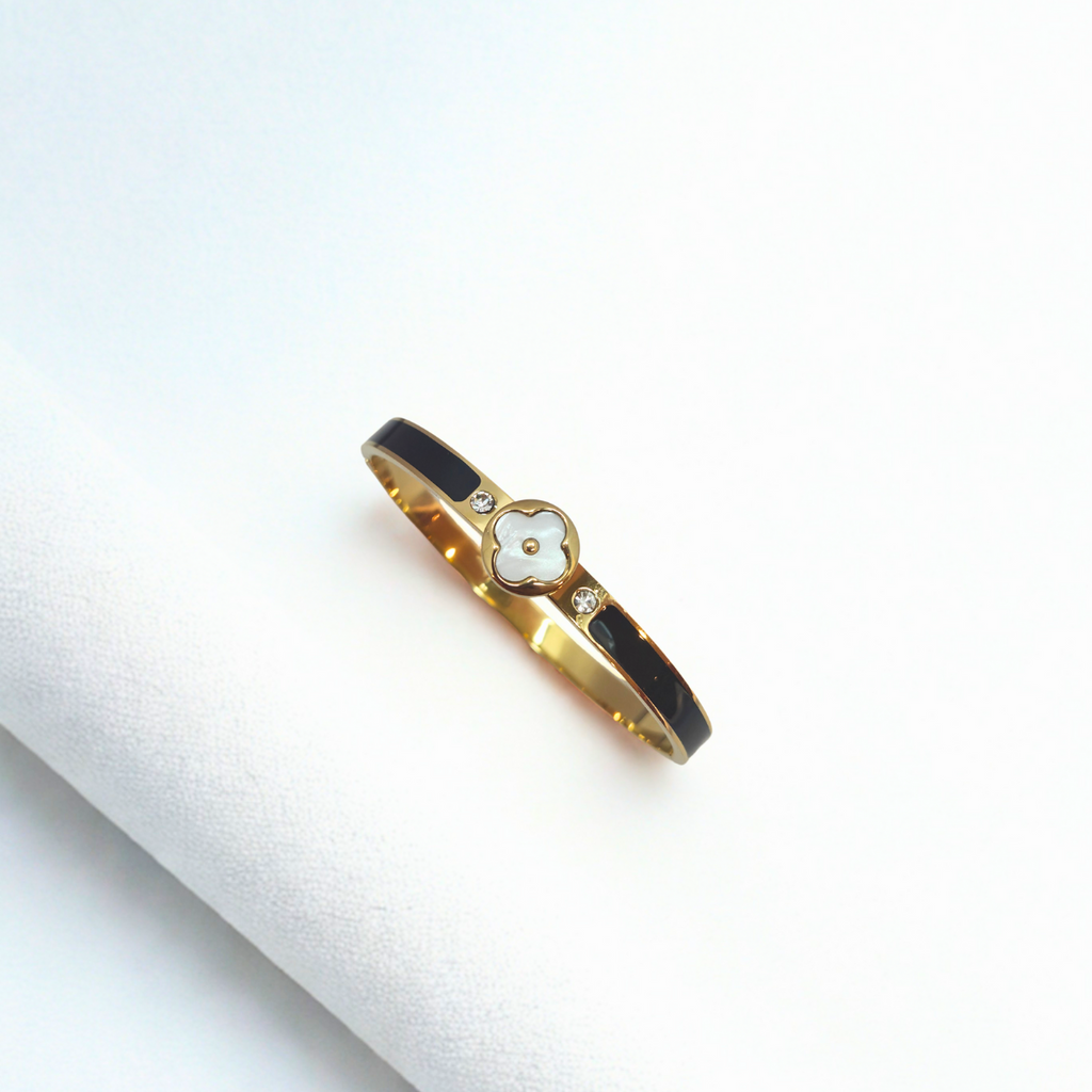 Bracelet rigide avec motif trèfle en nacre et zircone, détails émaillés noirs - 100 % acier plaqué or 18 carats