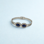 Pulsera Rígida con Dos Cristales Azules Ovalados y Circonitas - 100% Acero Bañado en Rodio
